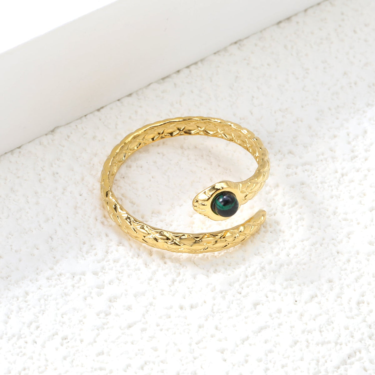 Bague en acier inoxydable torsadée émeraude