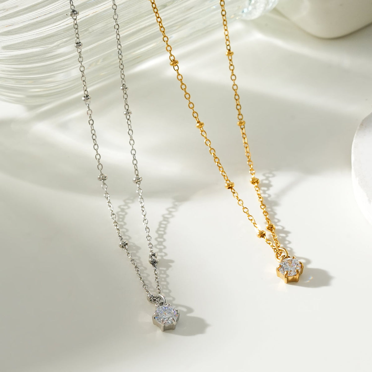 KADIRI Gold: Solitaire Zirconia Charm Pendant on a Beaded Chain Necklace