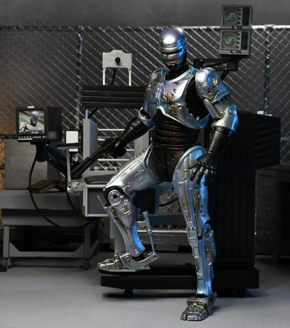 NECA - RoboCop Ultime Endommagé au Combat avec Chaise