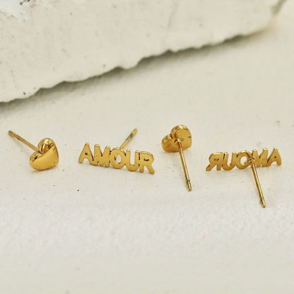 AMOUR & HEART Symbol – Romantic Statement 2-Pair Stud Earrings in Gold.