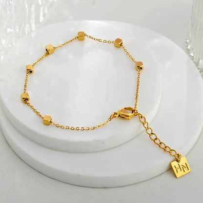 Bracelet EFFIE perles carrées dorées