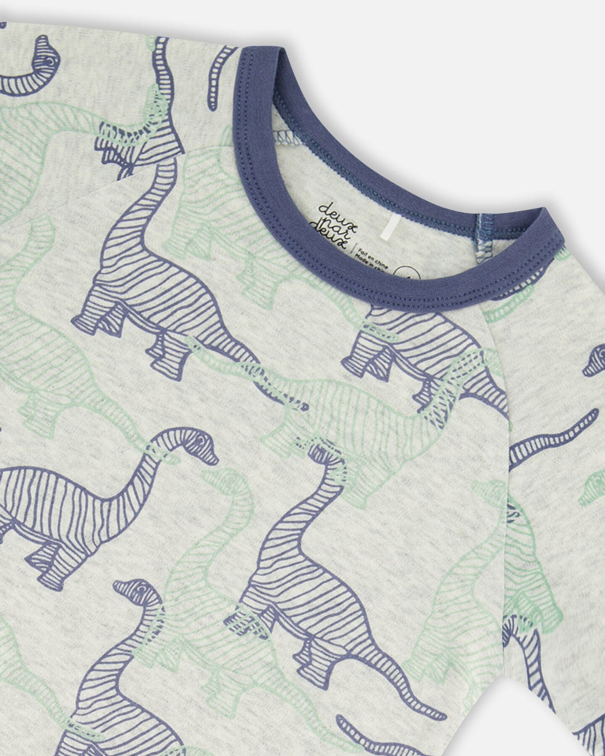 Pyjama court deux pièces en coton biologique, motif dinosaures, couleur beige chiné