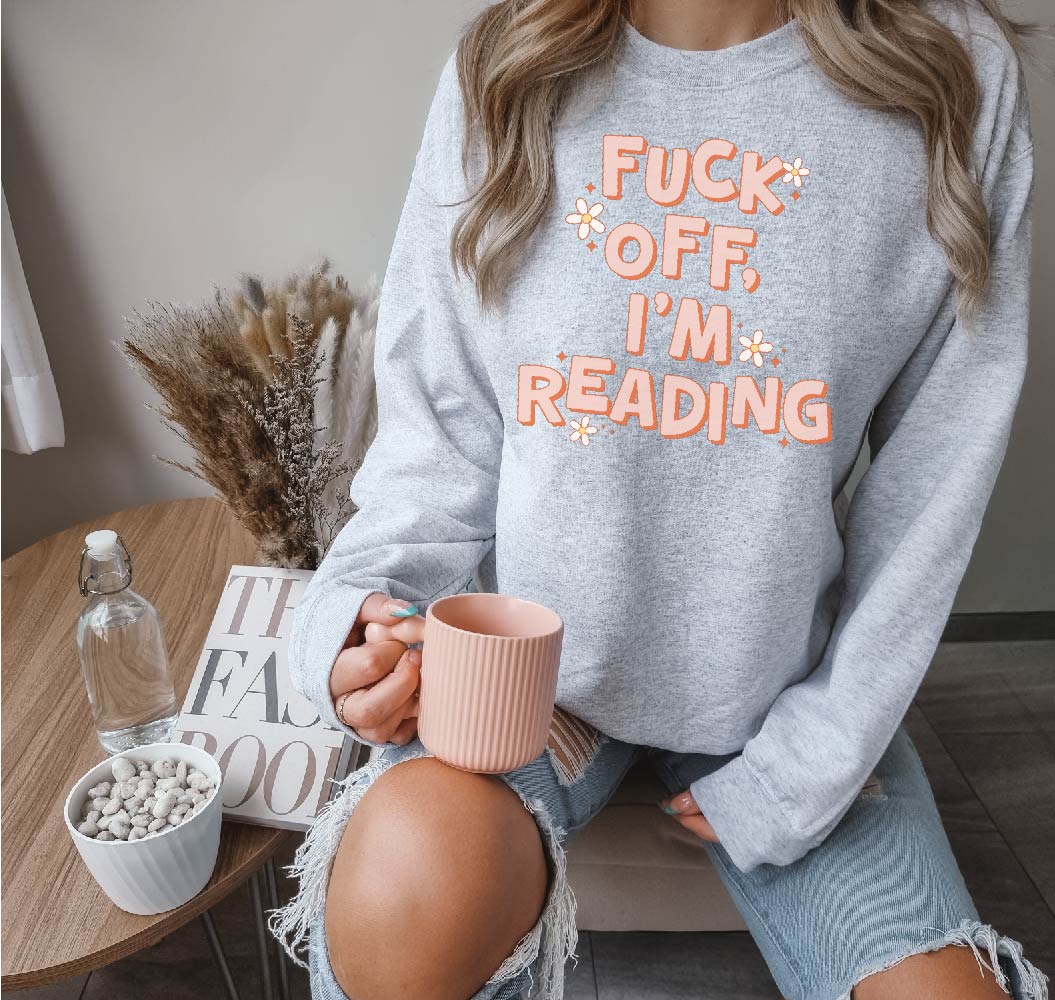 Sweat-shirt ras du cou unisexe « Foutez-moi la paix, je lis » | Vêtements littéraires