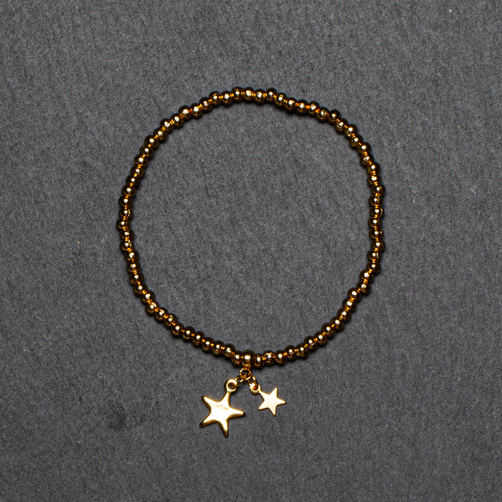 Elasticated Star Charm Bracelet In Gold Plate