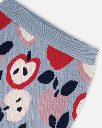 Jupe en maille bleue et rouge avec jacquard cœur et pomme