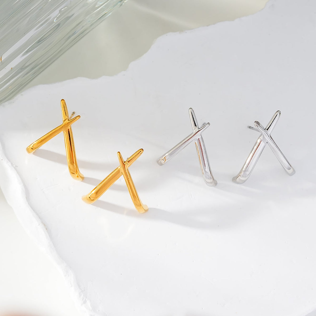 LINDSBORG: Criss-Cross Geometric Stud Earrings in Gold