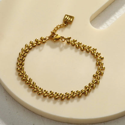 MAGDA Gold: Leafy Patterned Bold Bracelet