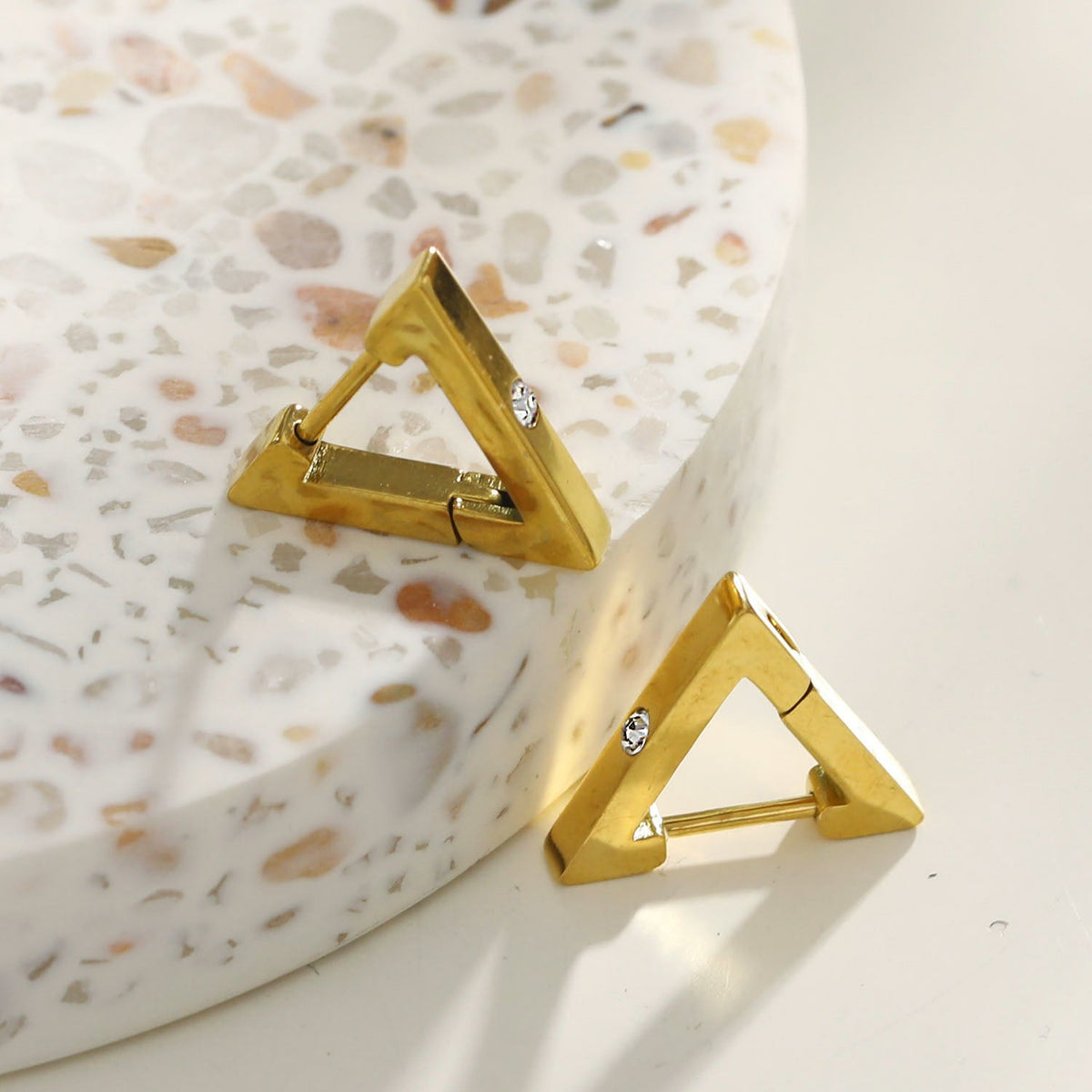 AMIRA: Triangle Shaped Mini Hoop Earrings with Solitaire Zirconia.