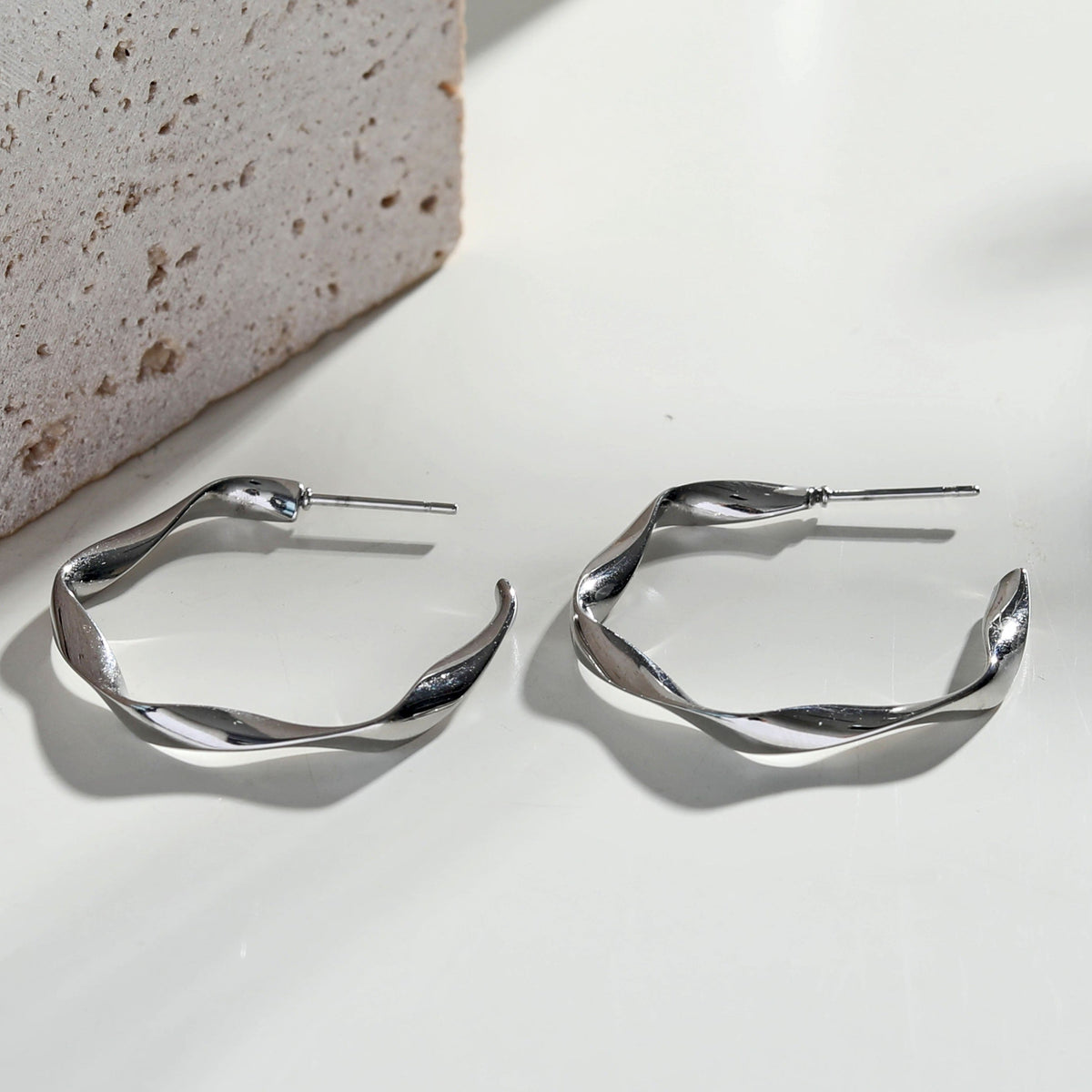 RIMINI Silver (White Gold): Sculpted Twist Hoop Earrings