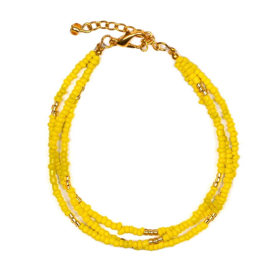Triple Strand Seed Bead Bracelet With Gold Accents