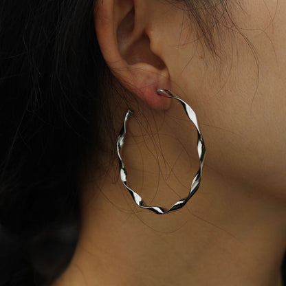 Boucles d'oreilles créoles VERONA torsadées ondulées argentées