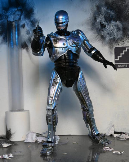 NECA - RoboCop Ultime Endommagé au Combat avec Chaise